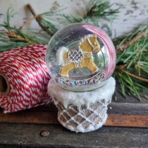 Gingerbread Scandinavian rocking horse snow globe by Gisela Graham