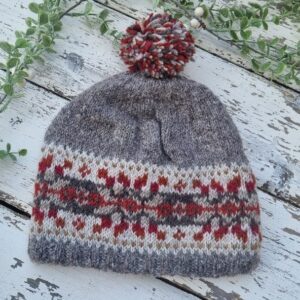 Inishmore Fairisle grey and rust knitted hygge lined bobble hat/beanie