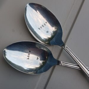 Set of two large hand-stamped "hygge and home" vintage silver spoons