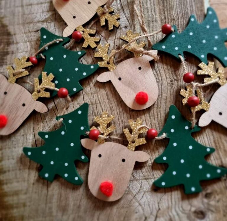 wooden-reindeer-and-christmas-tree-garland-768x747 Scandi Christmas decorations: a guide to traditional Nordic Christmas decor