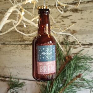 Bottle of North Pole brew beer Christmas bauble by Gisela Graham
