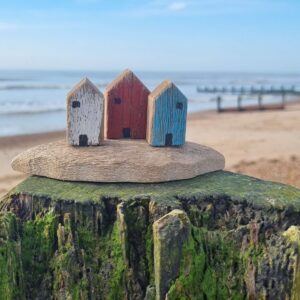 Rustic wooden beach huts trio ornament