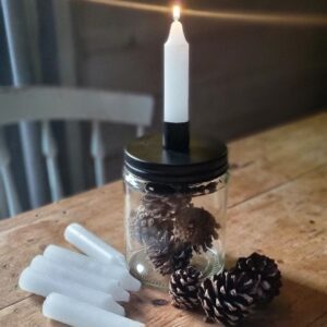 Danish black metal and glass and candle storage jar and holder, with six white candles