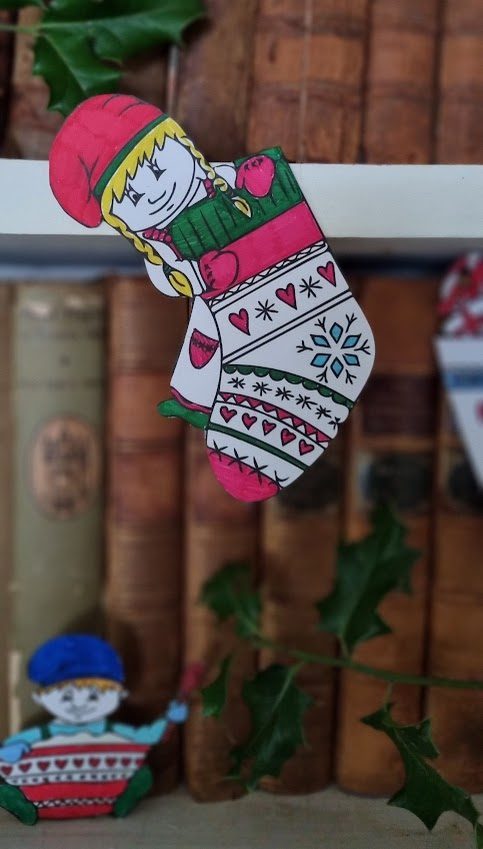 how-to-make-danish-cut-out-paper-pixies-kravlenisser-2 Free Printable Danish Kravlenisser (Paper Christmas Elves) to Colour In