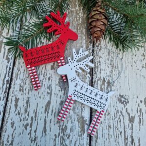 Set of two red and white fretwork wood Scandi reindeer by Gisela Graham