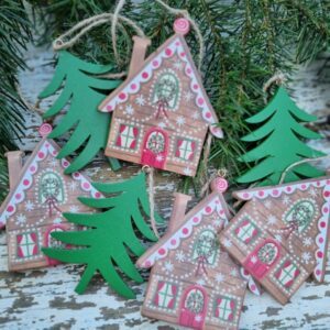 Wooden gingerbread house and Nordic pine tree Christmas garland