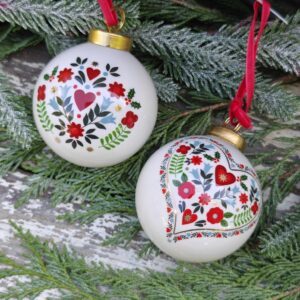 Set of two ceramic Alpine folk art pale blue, red and white Scandi Christmas baubles by Gisela Graham