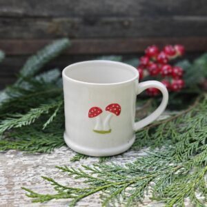 Toadstools Christmas rustic ceramic mini mug by Gisela Graham