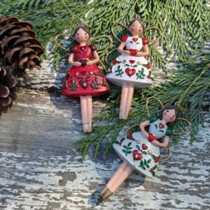 Set of three resin Alpine folk art mint green, red and white Scandi Christmas fairies by Gisela Graham