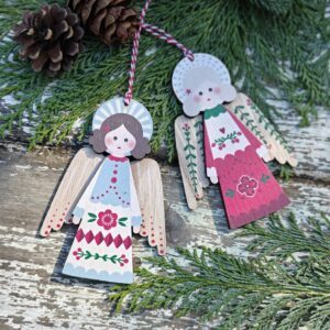 Set of two wooden Alpine folk art mint green, red and white Scandi Christmas angels by Gisela Graham