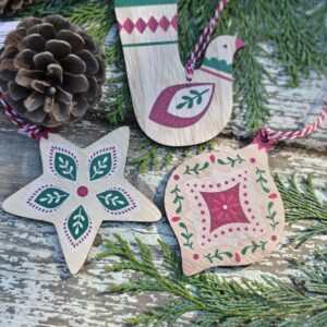 Set of three wooden Alpine folk art bird, star and bauble Scandi Christmas tree decorations by Gisela Graham