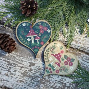 Set of 2 wooden cream/green hearts with fly agaric toadstools ornaments by Gisela Graham