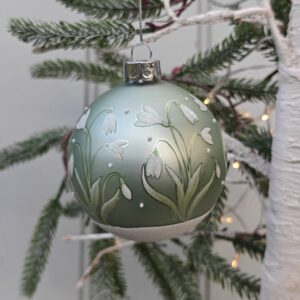 Matt green and snowy white glass bauble with snowdrops by Gisela Graham