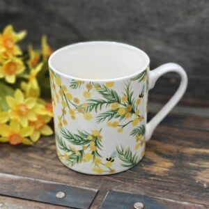 Spring mimosa and bumble bee bone china coffee mug by Gisela Graham
