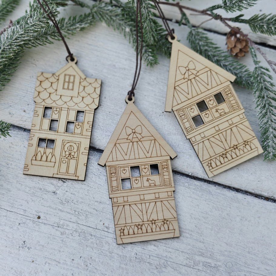Close-up of the Scandi birch house ornaments with Nordic star and dala horse cut-outs